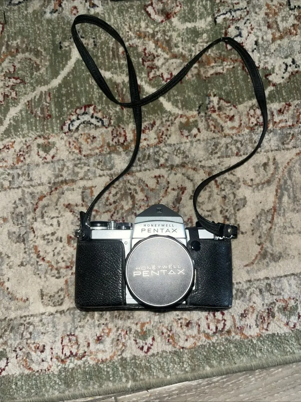 Vintage Honeywell Pentax 35 Mm Camera Features A Classic Silver And Black Finish
